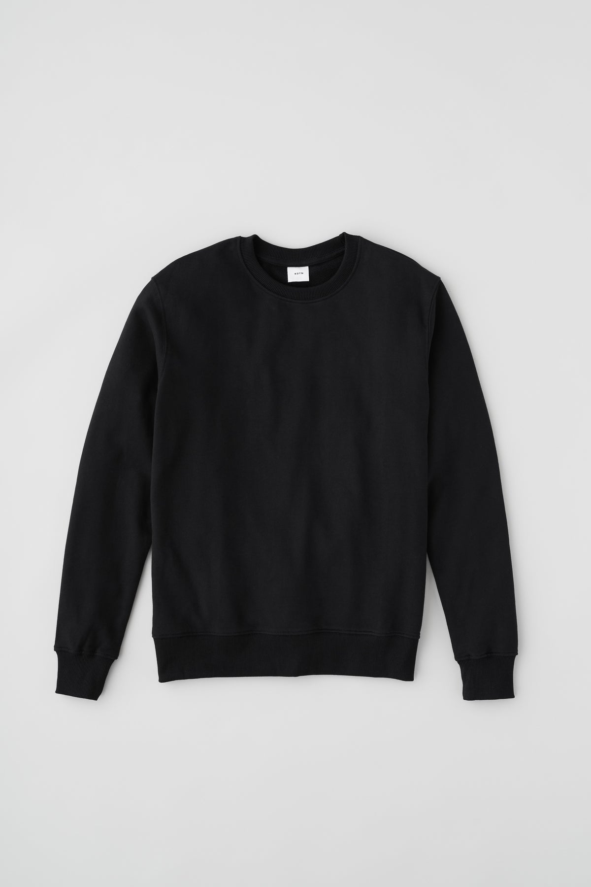 Coton ouaté unisexe en molleton bouclé en noir - DO NOT PUBLISH ONLINE CHECK WITH YOYA