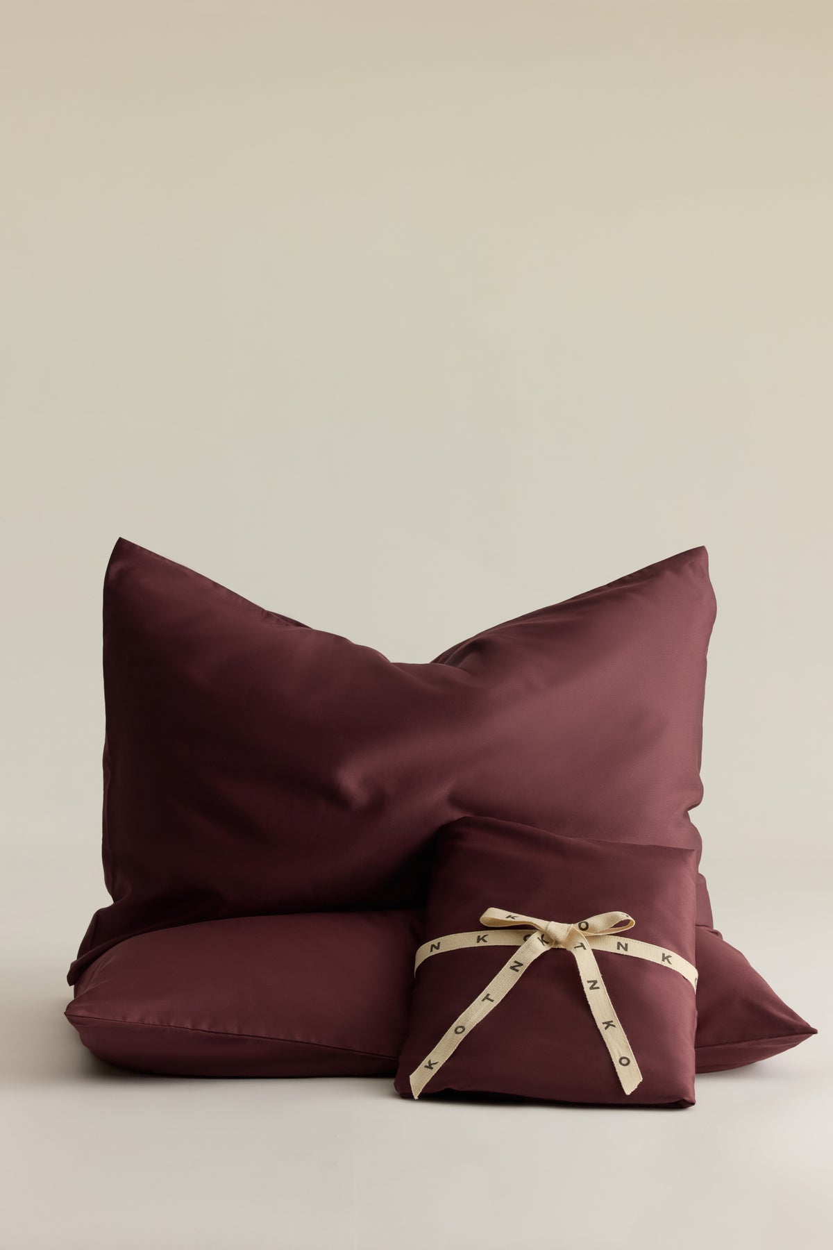 Ensemble drap-housse et taie d'oreiller en prune chocolat