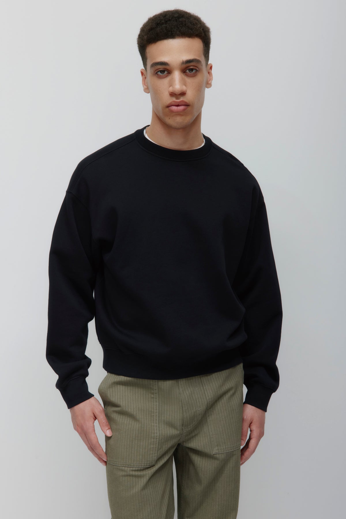 Model is 6'0.5' and is wearing a size M.
