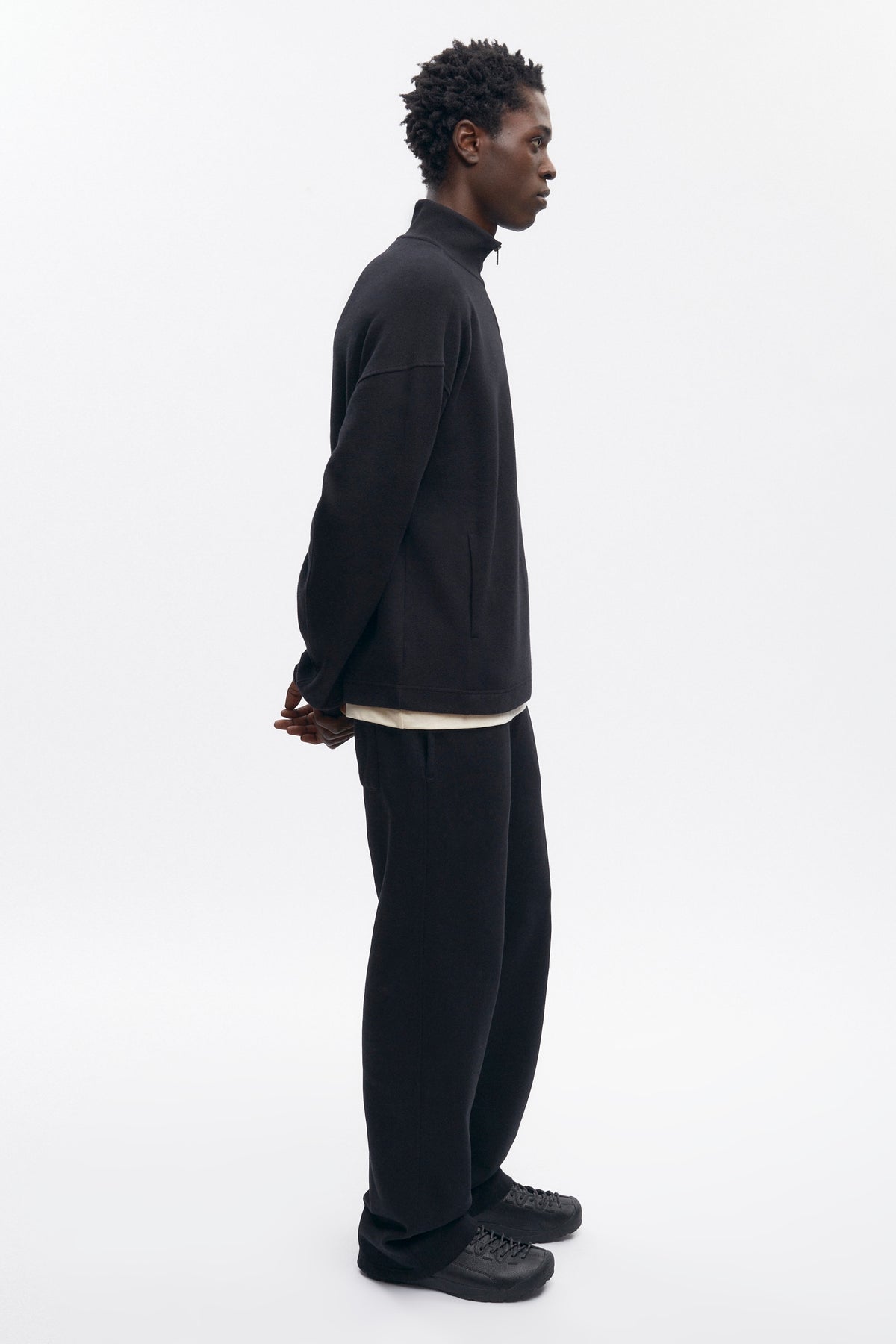 Pull à fermeture éclair quart de longueur pour homme en noir