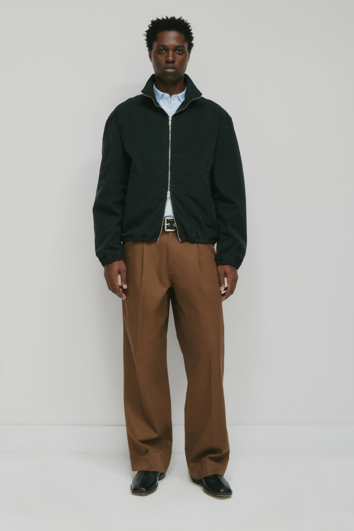 Model 6.2" and is wearing a size L.