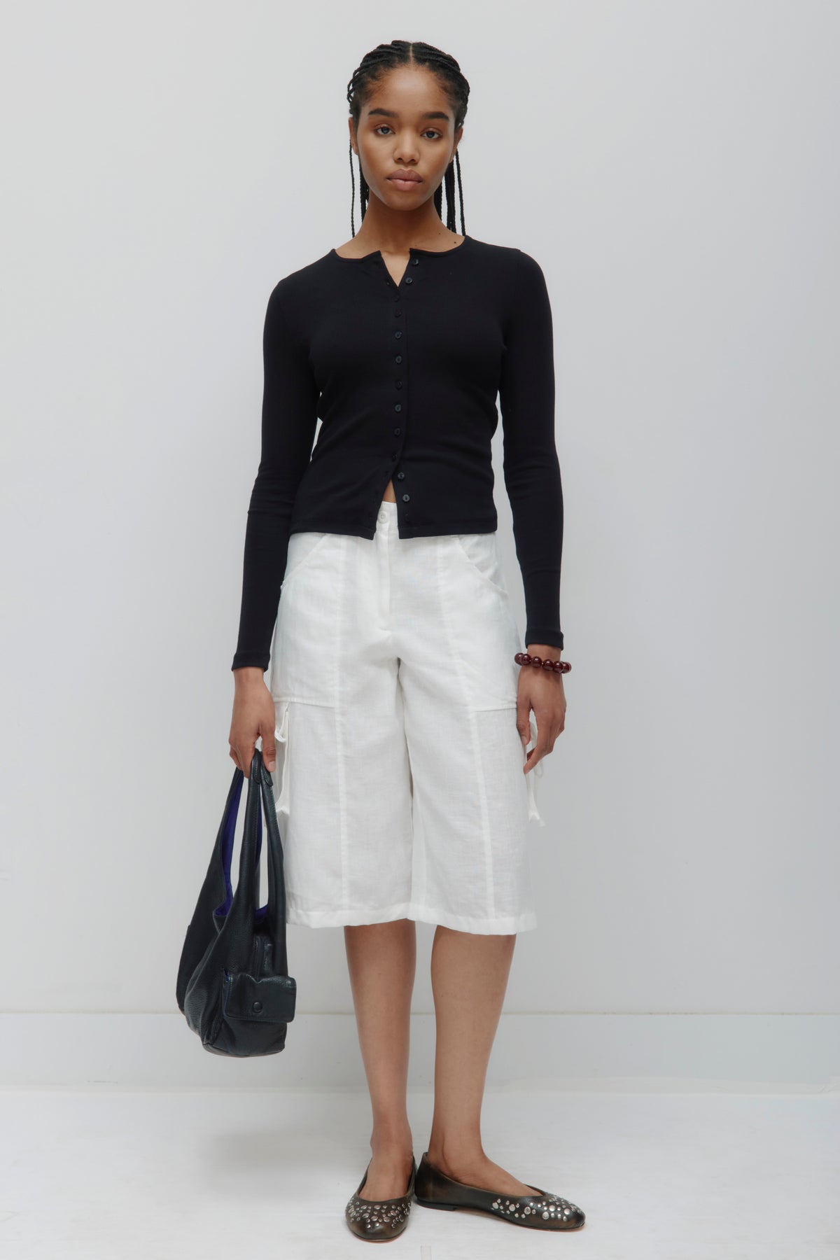 Cardigan à col ras du cou pour femmes en noir