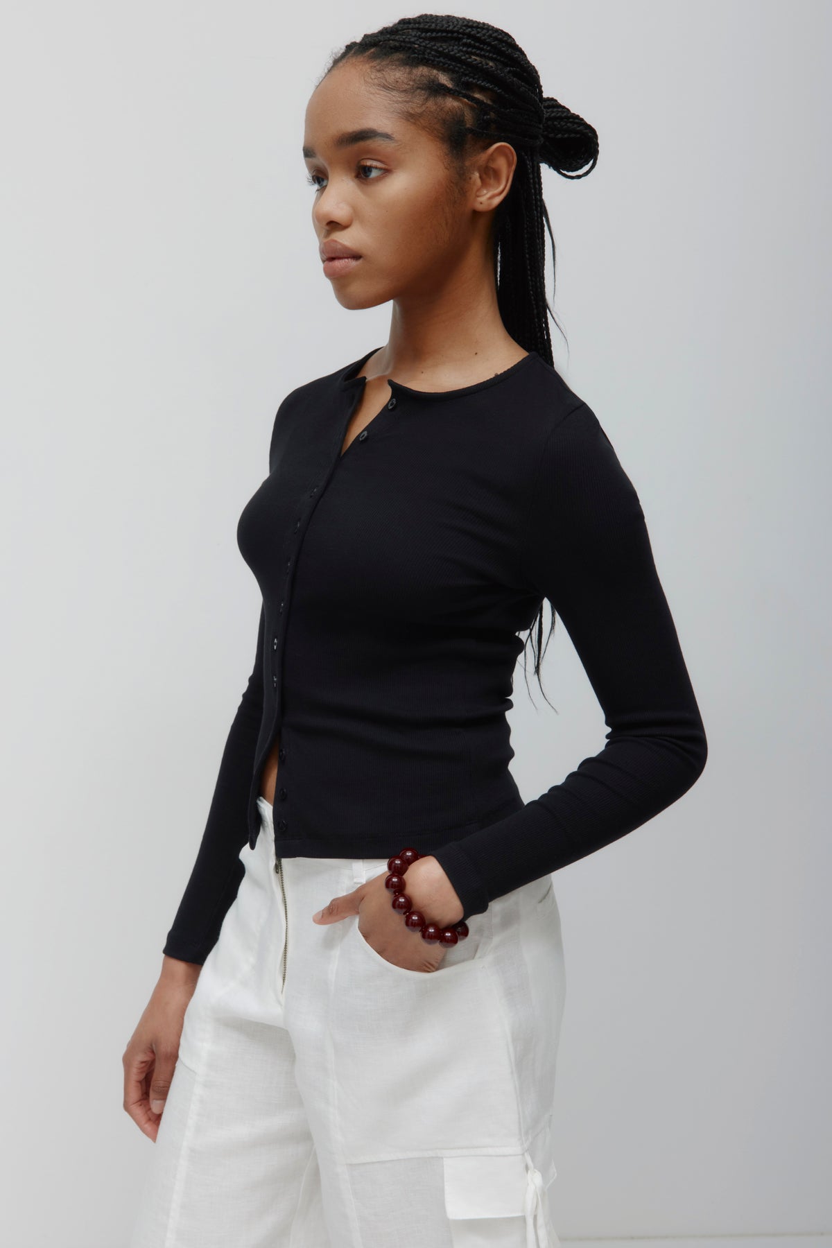 Cardigan à col ras du cou pour femmes en noir