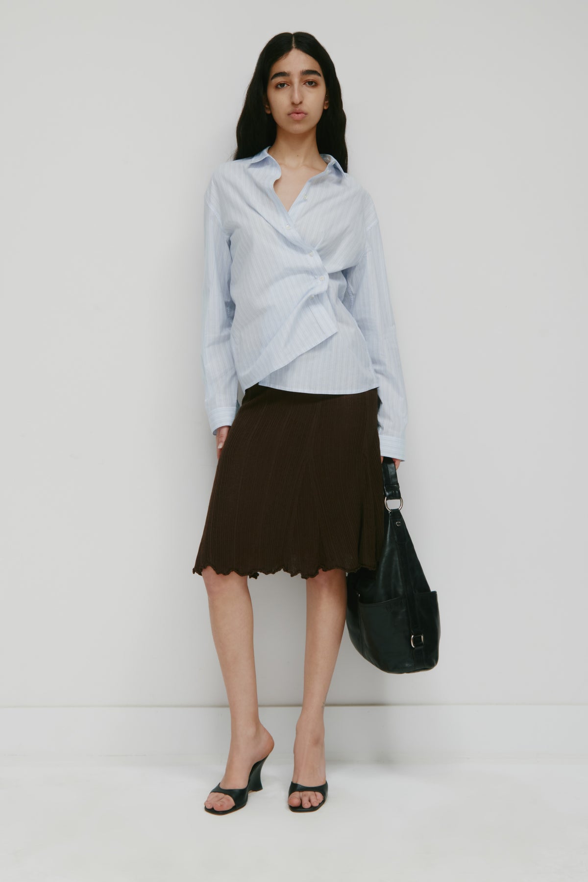 Model is 5’9” and is wearing a size XS.