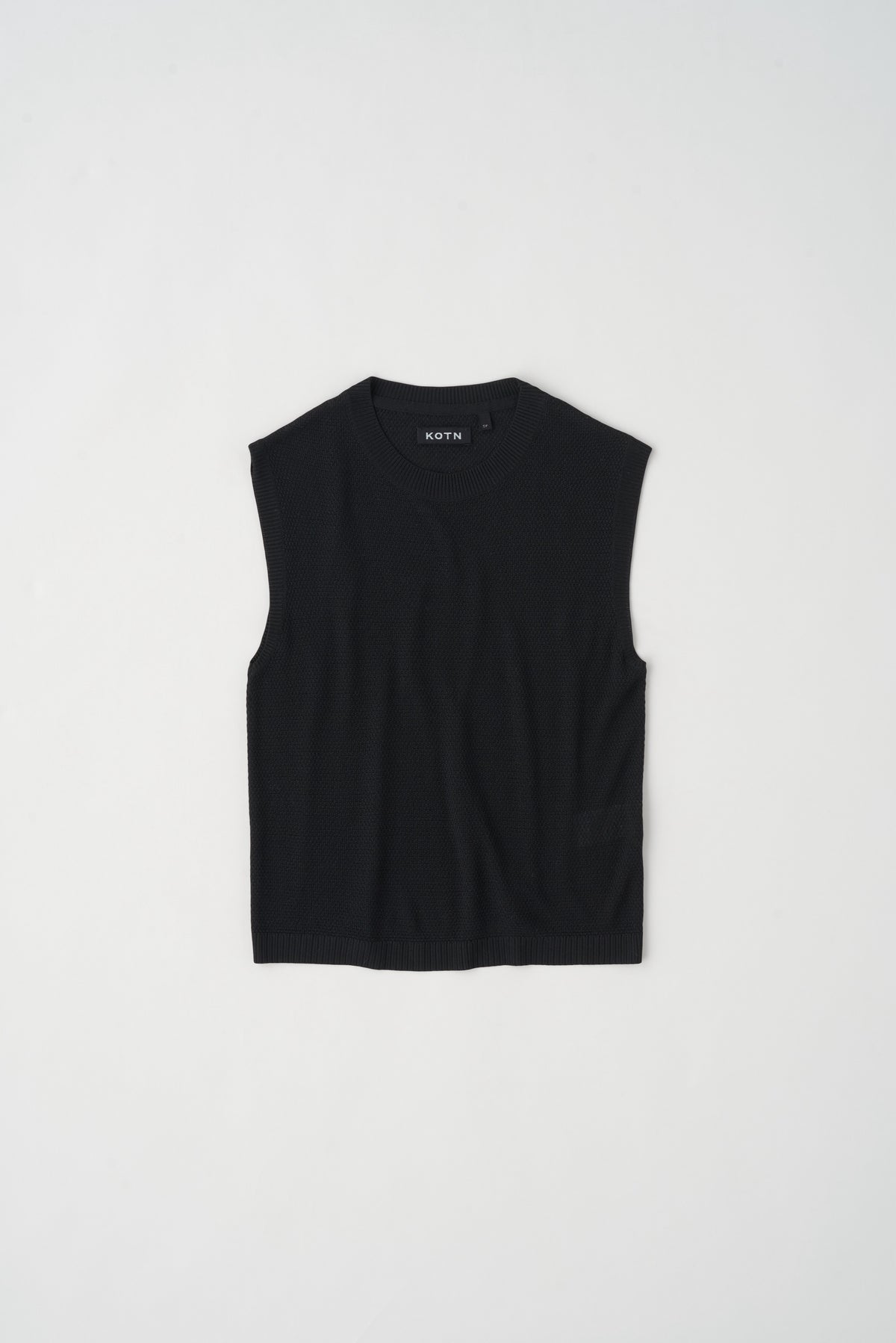 T-shirt sans manches en maille pour femmes en noir