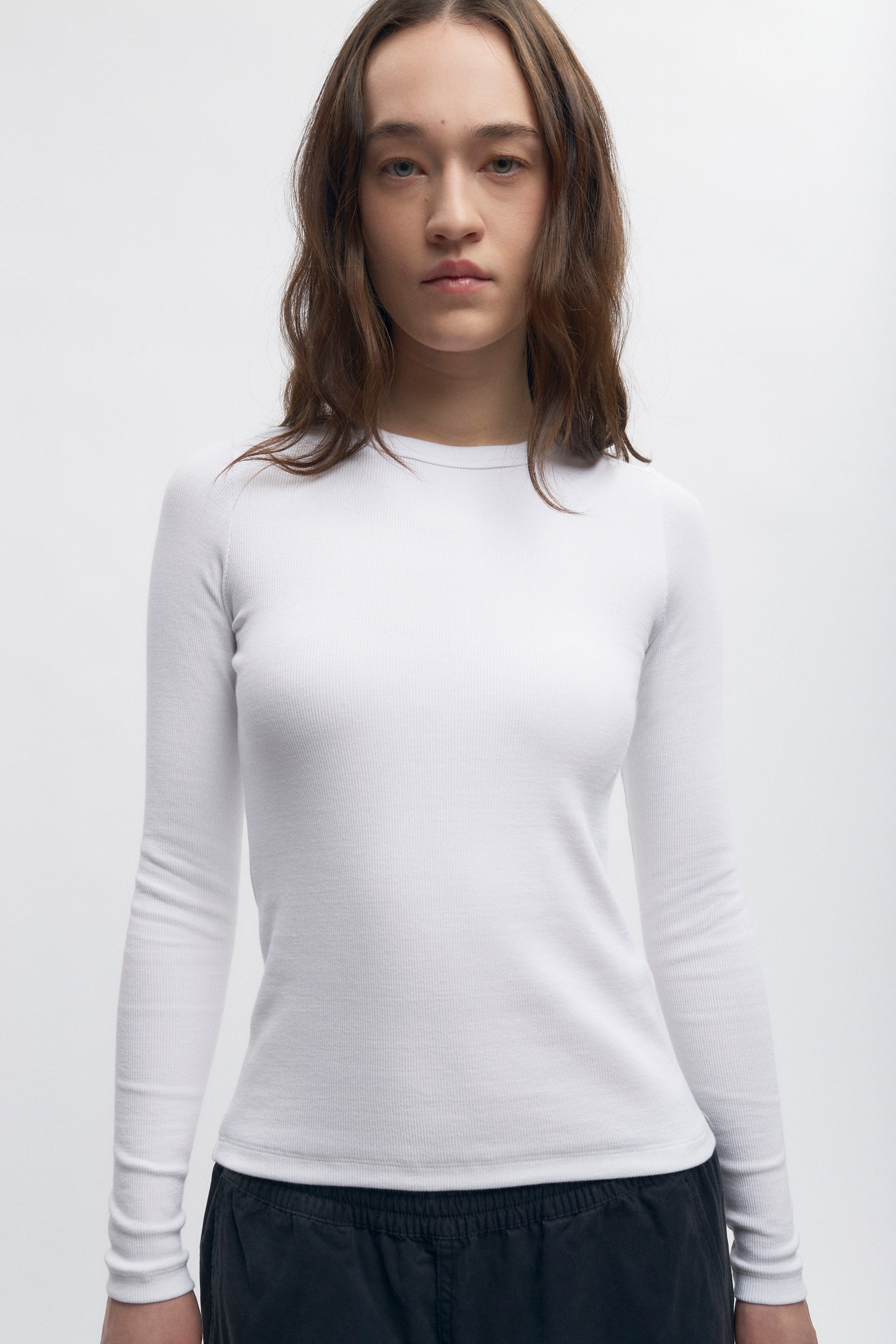 Manches longues ajustées en côtes pour femmes en blanc