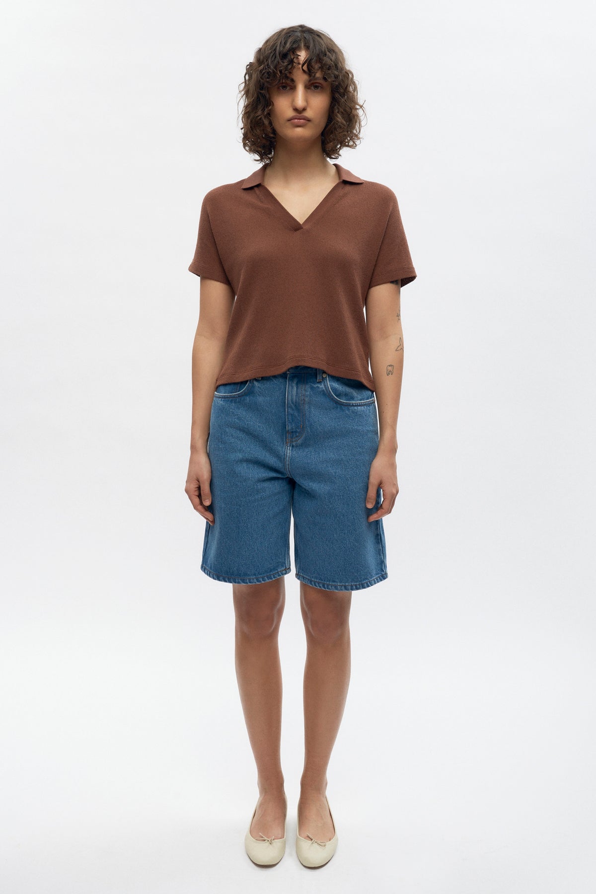 Francis is 5ft 9.5in, a regular size XS and wearing a S.