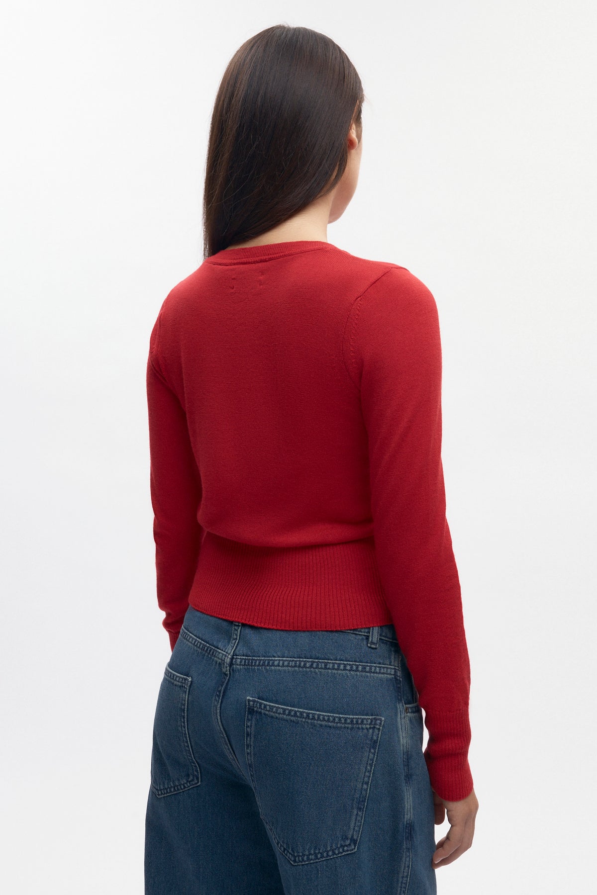 Pull à col en V en laine mérinos pour femme en rouge vif