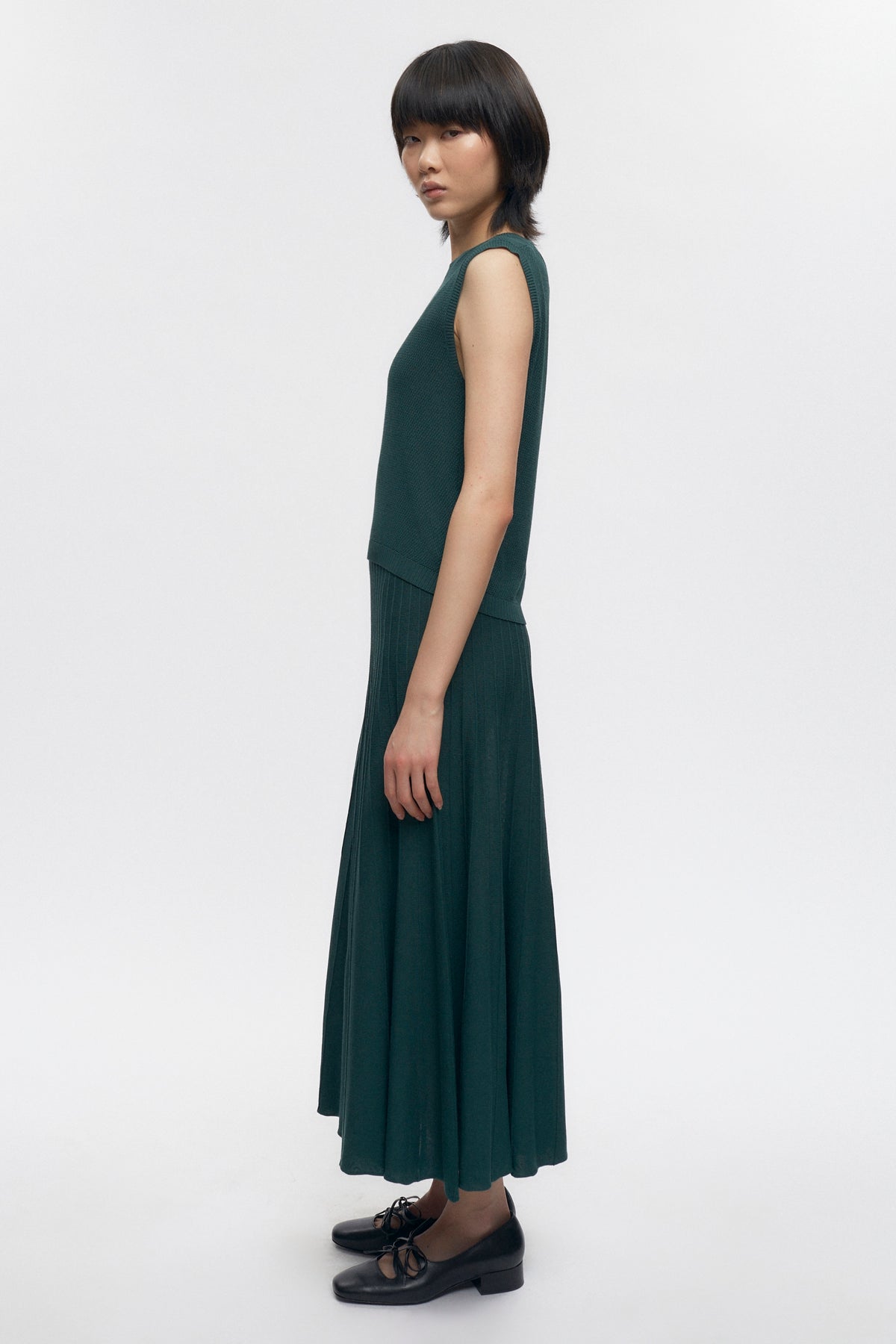 T-shirt sans manches en maille pour femmes en racing Green
