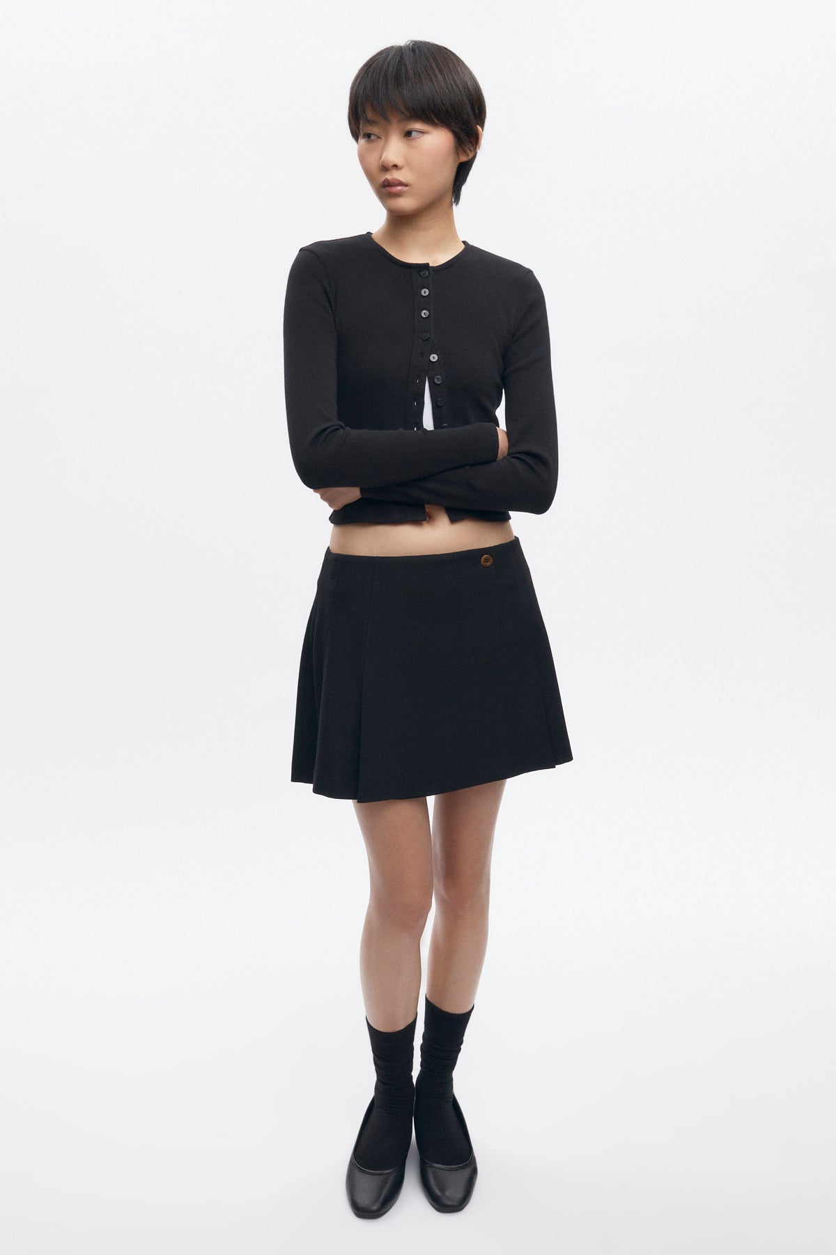 Mini-jupe plissée Muna pour femme en noir