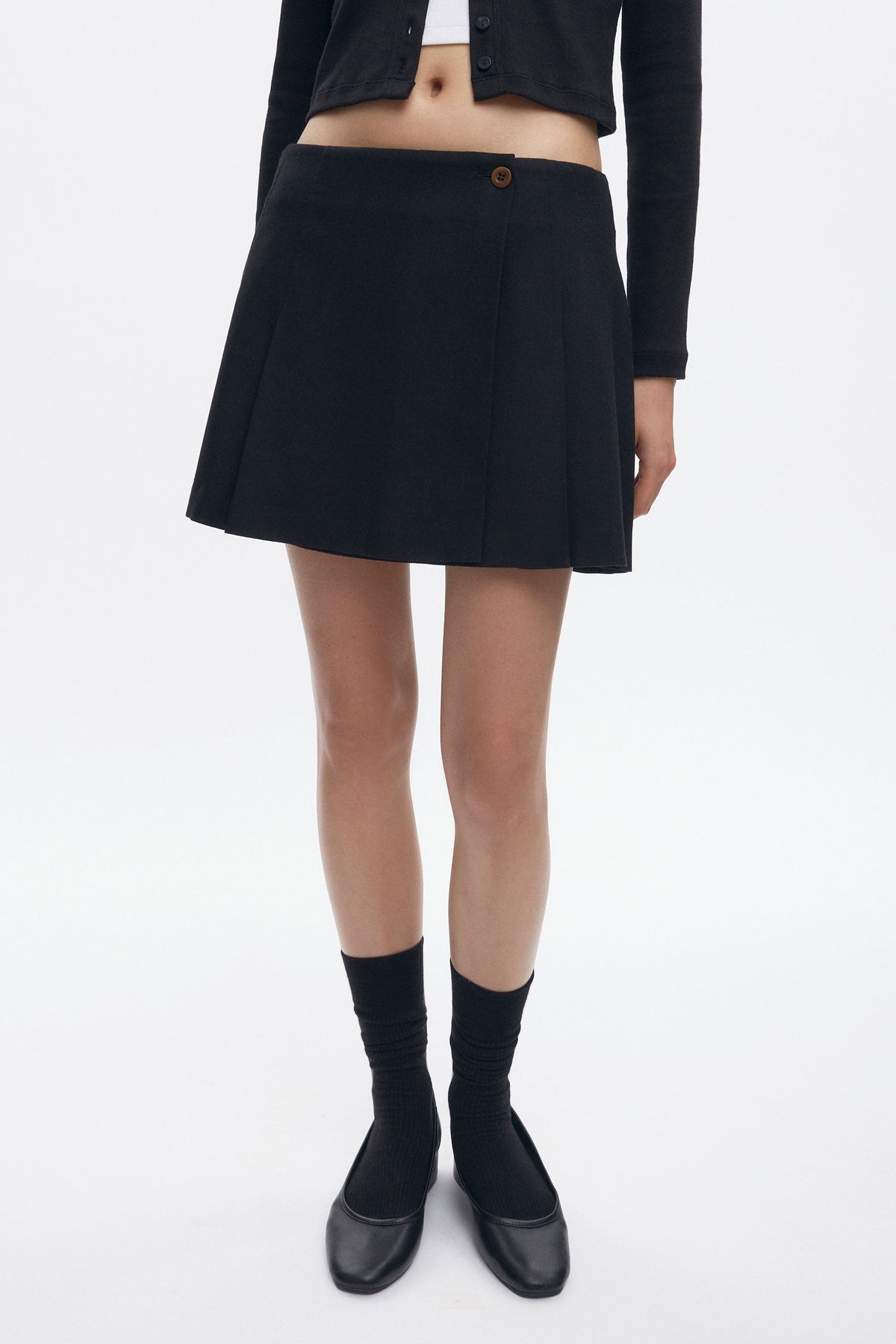 Mini-jupe plissée Muna pour femme en noir