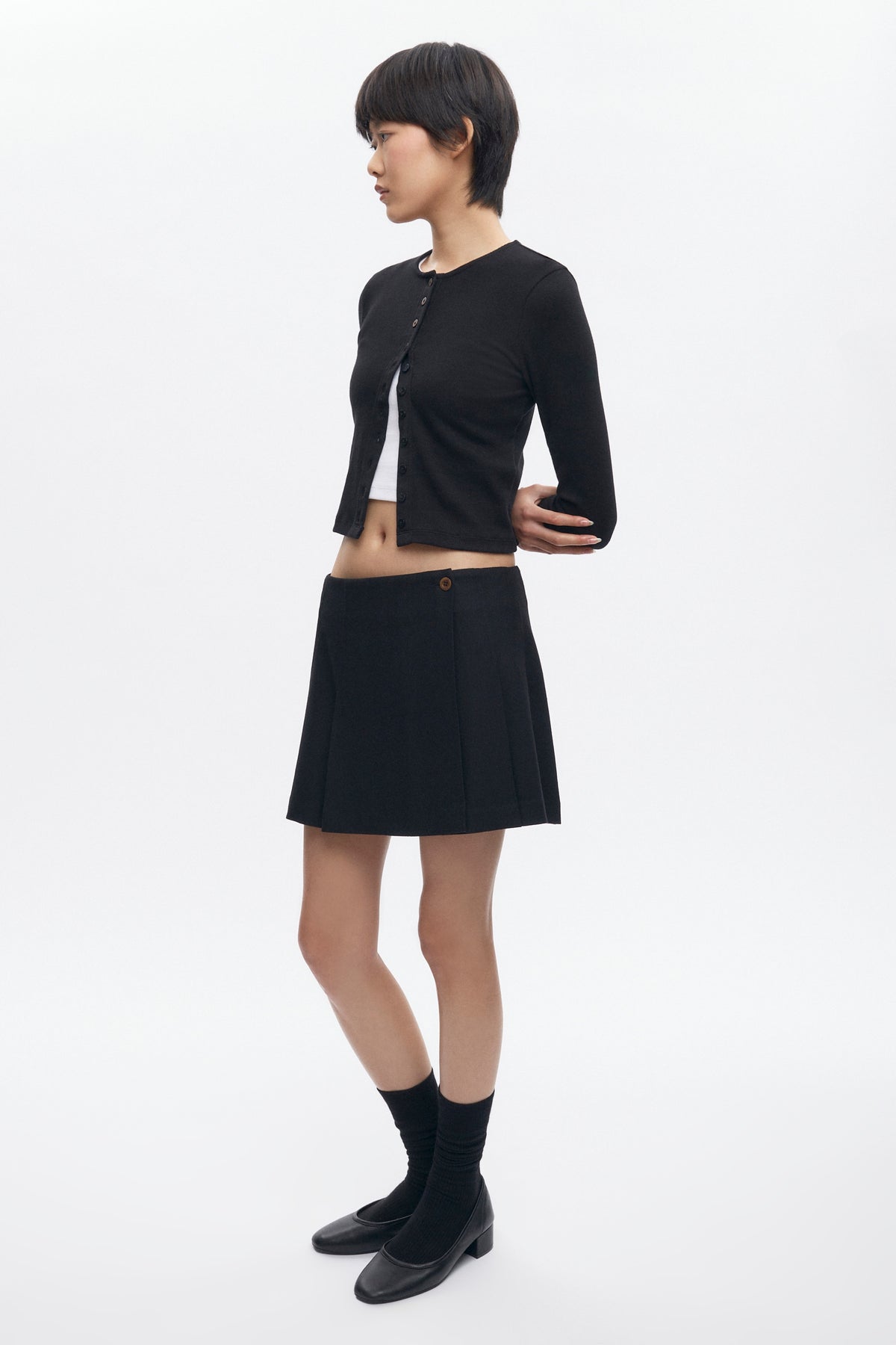 Mini-jupe plissée Muna pour femme en noir