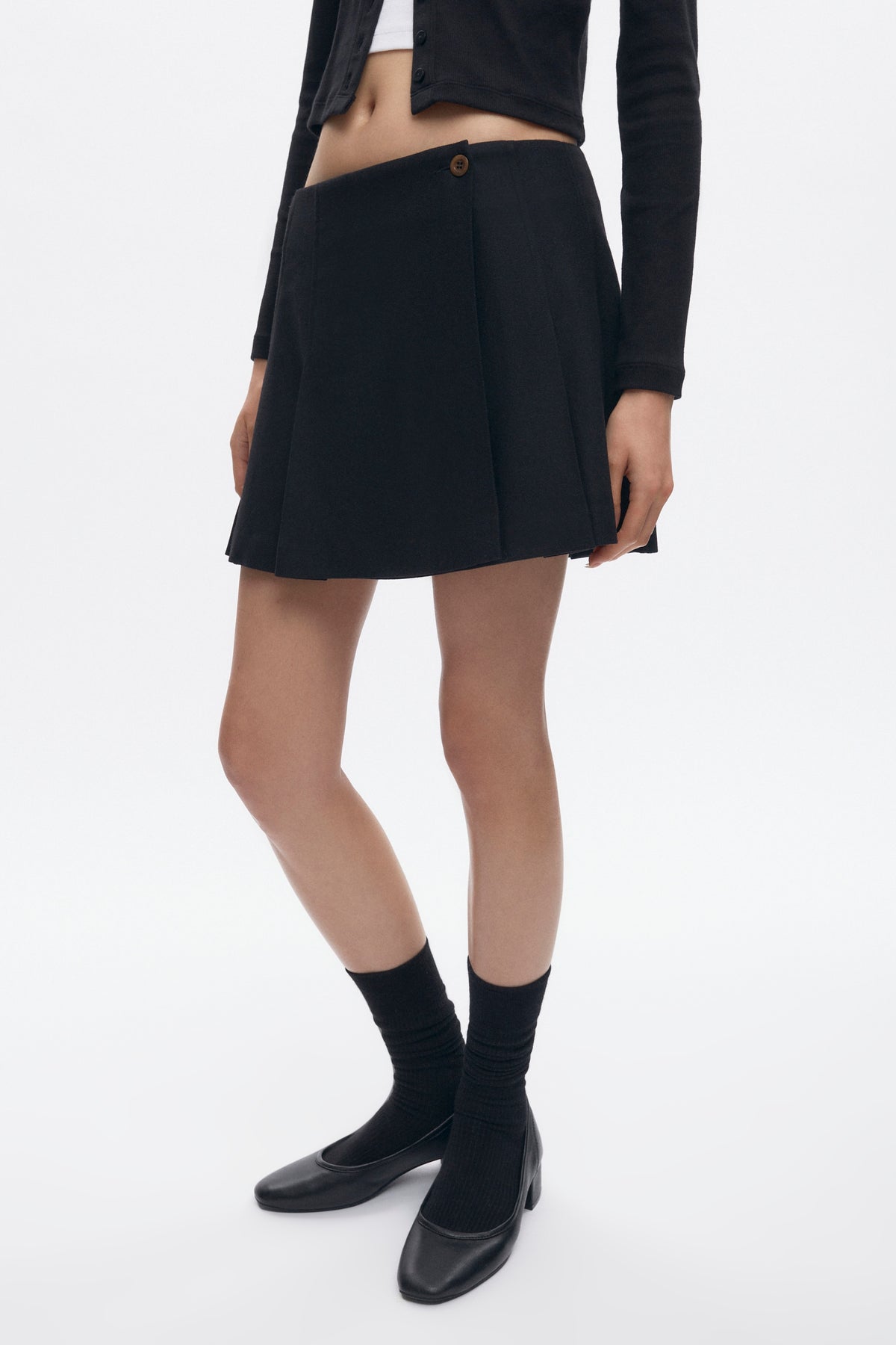 Mini-jupe plissée Muna pour femme en noir