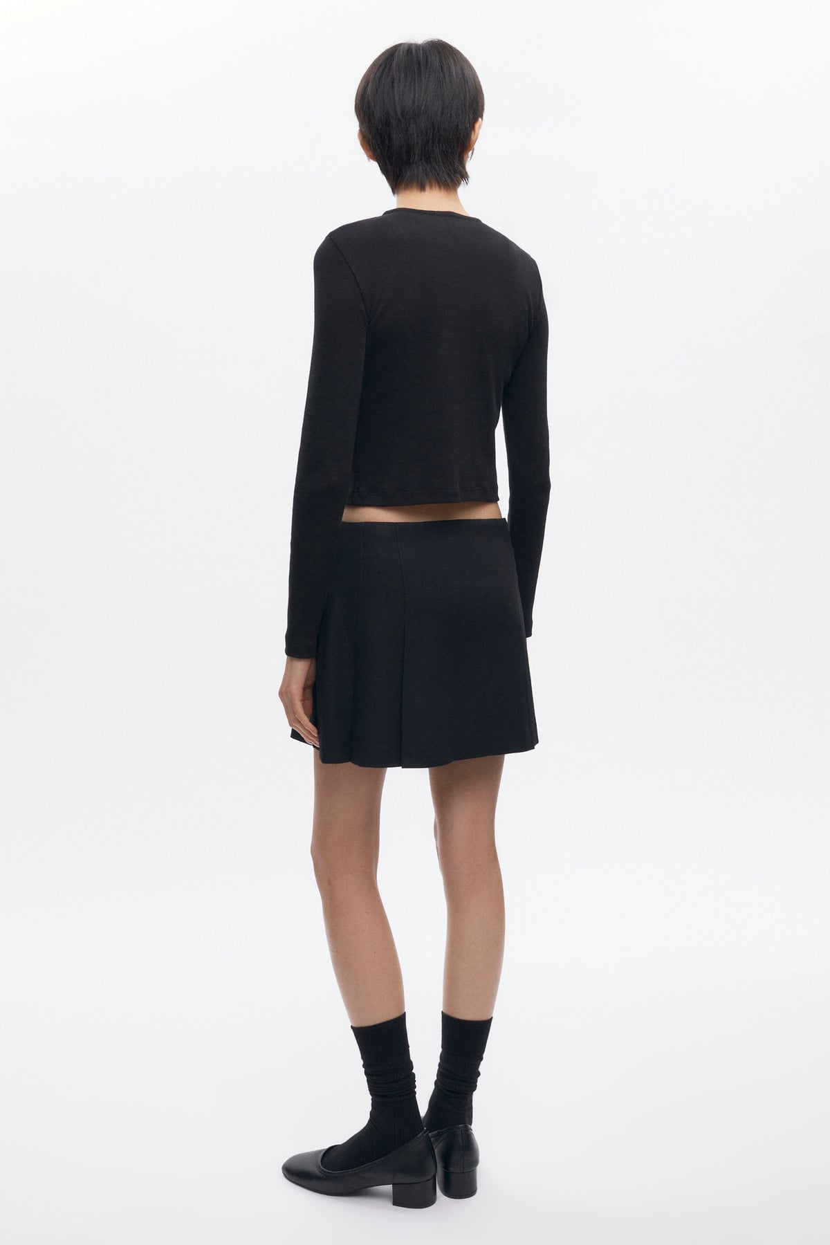 Mini-jupe plissée Muna pour femme en noir
